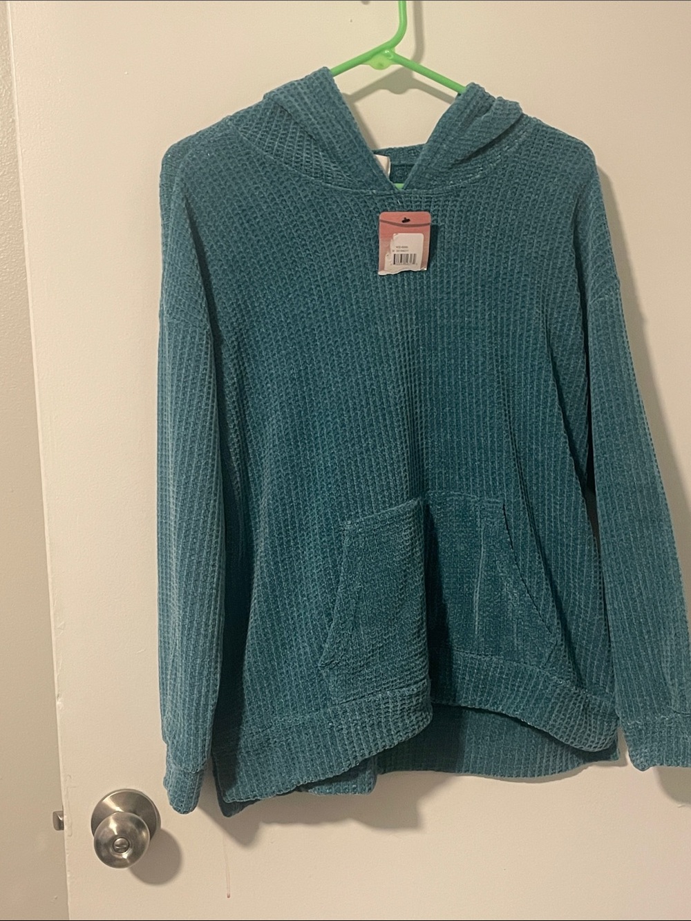 Brand new women’s size large! Cozy Teal Waffle Knit Hooded Pullover